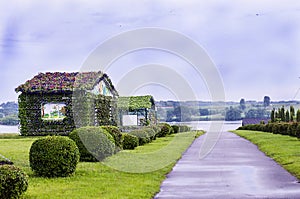 House decorated with fresh flowers in the park