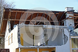 House demolition. A damaged house
