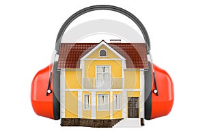 House with ear defenders. Protection against noise, concept. 3D rendering