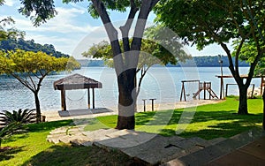 House on the edge of the lake, with a green landscape, well shaded, with a path to Lagoa Nova, Linhares, ES, Brazil.d