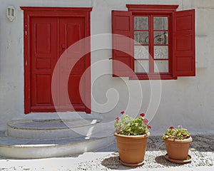 House entrance and flowerpots
