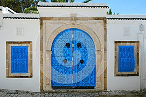 House entrance in tunisian arabic style photo