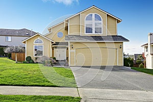 House exnterior with garage. View from driveway