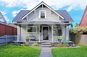 House exterior. Entrance porch and front yard view