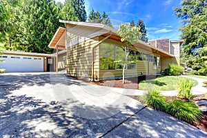 House exterior with garage and driveway