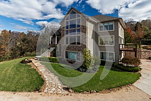 House exterior, nice curb appeal, large front windows.