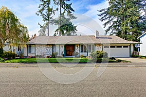 House exterior with stone wall trim