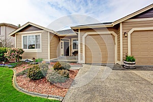 House exterior. View of entrance porch and driveway