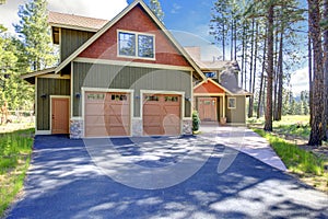 House exterior. View of garage and driveway