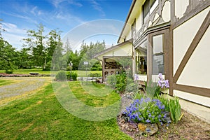 House exterior. View of landscape on front yard