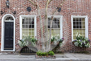 House Exterior Window Boxes Against Red Brick