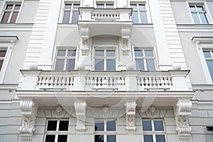 House facade with windows, balconies in wroclaw, poland