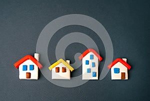 House figures. Realtor services. Find most suitable housing options.