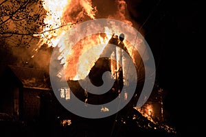 House fire with intense flame, fully engulfed house fire