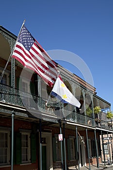 House with flags in French Quarter New Orleans