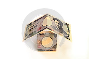 House folded from Japanese yen banknotes.