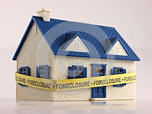 House with Foreclosure tape ground view