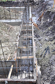 House foundation slabs with iron bars.