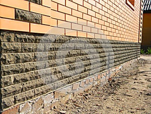 House foundation wall repair exterior. photo