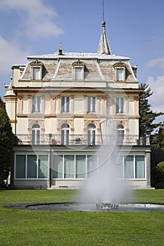 House with fountain in villa taranto photo