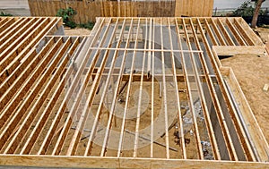 House framing floor construction showing joists trusses