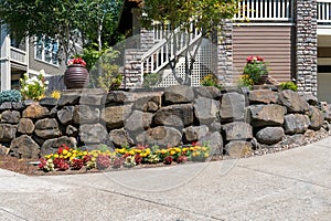 House Front Yard Landscaping with Rock Retaining Wall