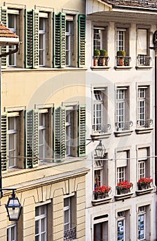 House fronts with windows and shutters at the old town of Bern, Switzerland.