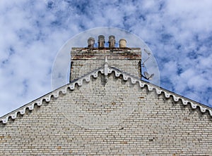 House gable end with chimney pots