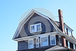 Gambrel style roof on historic house in Cape May, New Jersey photo