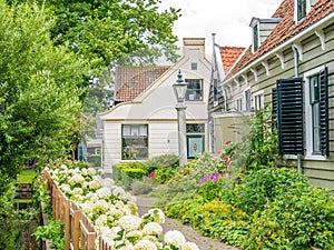 House and garden in picturesque old town of Broek in Waterland,
