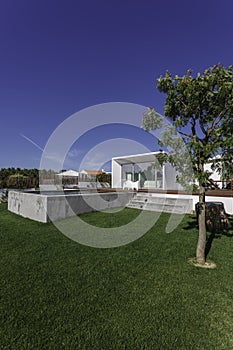 House with garden swimming pool and wooden deck