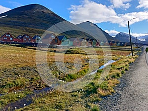 House,grass , mountain sunnyday , colourfully