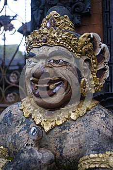 House guard statue close-up in Penglipuran Traditional Village in Bali Indonesia