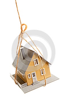 House Hanging by a String