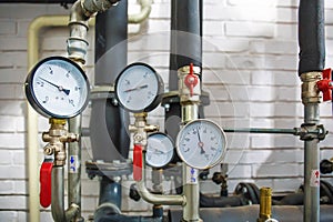 House heating system with many steel pipes, manometers and metal tubes