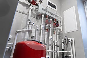 House heating system with modern plastic pipes, manometers and tubes close up in boiler room