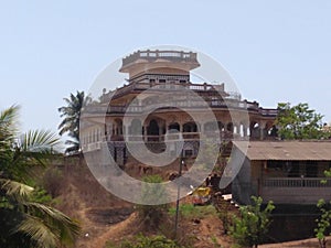 A house on a hill. it is also three storeyed
