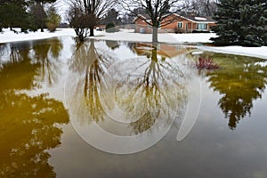 House, Home Flooding From Winter Snow Melt