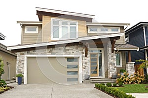 House Home Tan Beige White Exterior Elevation Roof Peak Details photo