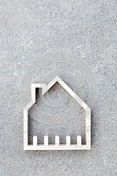 House icon on concrete background, Home construction