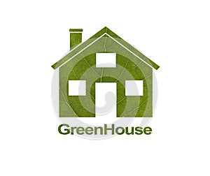 House icon on a white isolated background from a gold leaf. The inscription Green House. Close-up