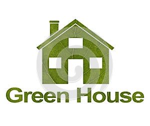 House icon on a white isolated background from a green leaf. The inscription Green House. Close-up