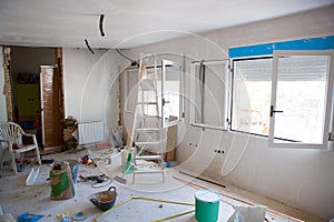 House indoor improvements in a messy room construction photo