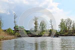 The house and kayak on Bityug river in Voronezh region, Russia