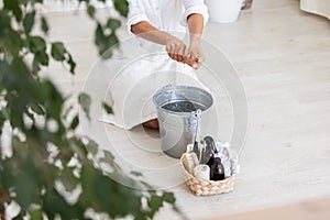 House keeping concept. Woman wiping floor. Woman doing chores at home.