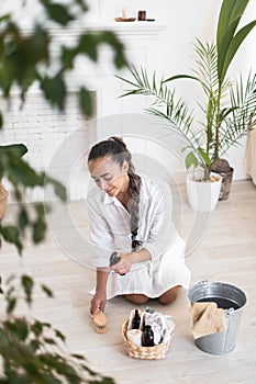 House keeping concept. Woman wiping floor. Woman doing chores at home.