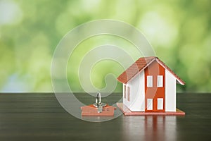 house and keys with bokeh background