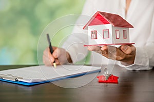 house and keys with bokeh background