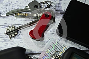 House keys, car keys, driver`s license, and phone