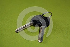 house keys on a green background